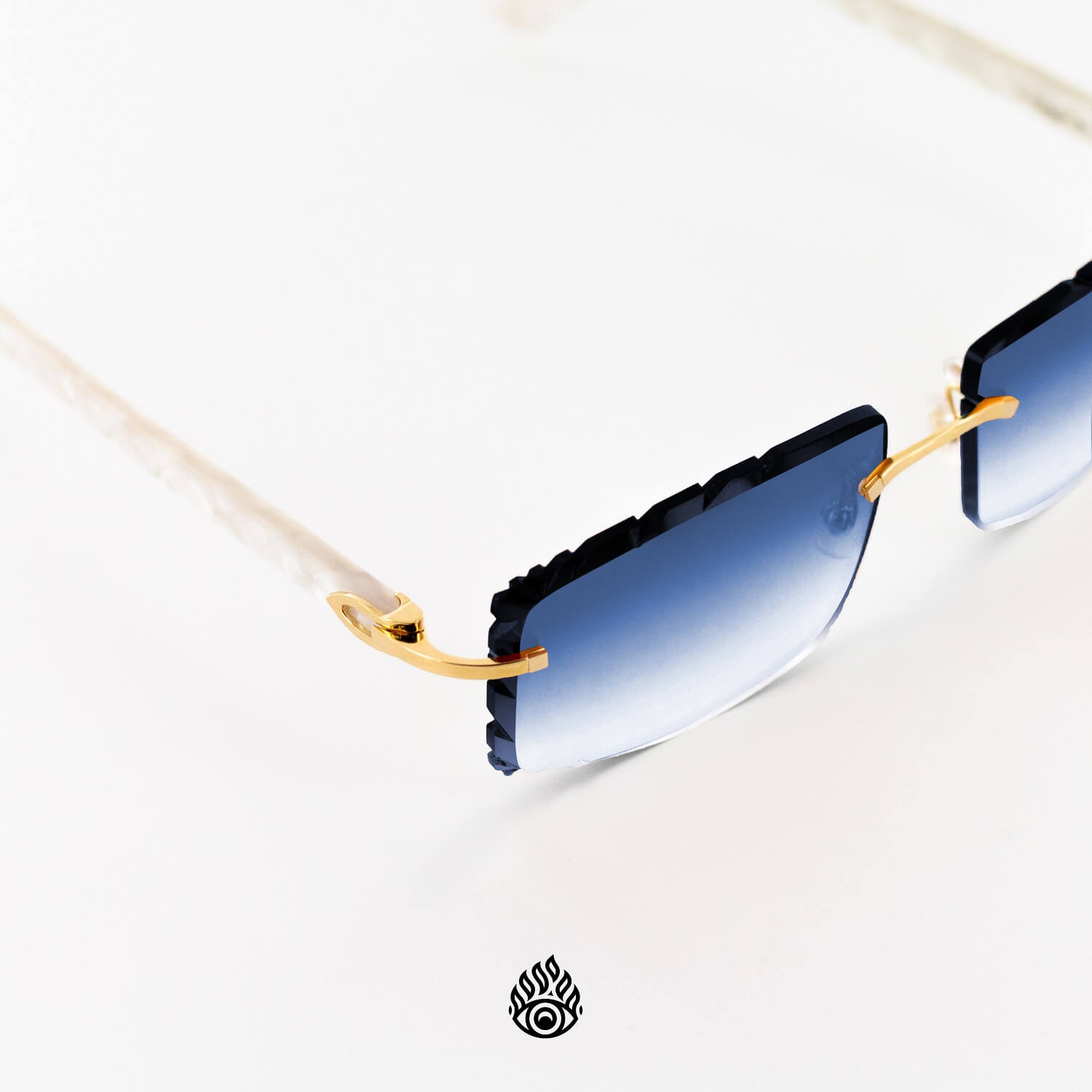 Cartier White Acetate Glasses with Gold C Decor Gradient Blue Lens