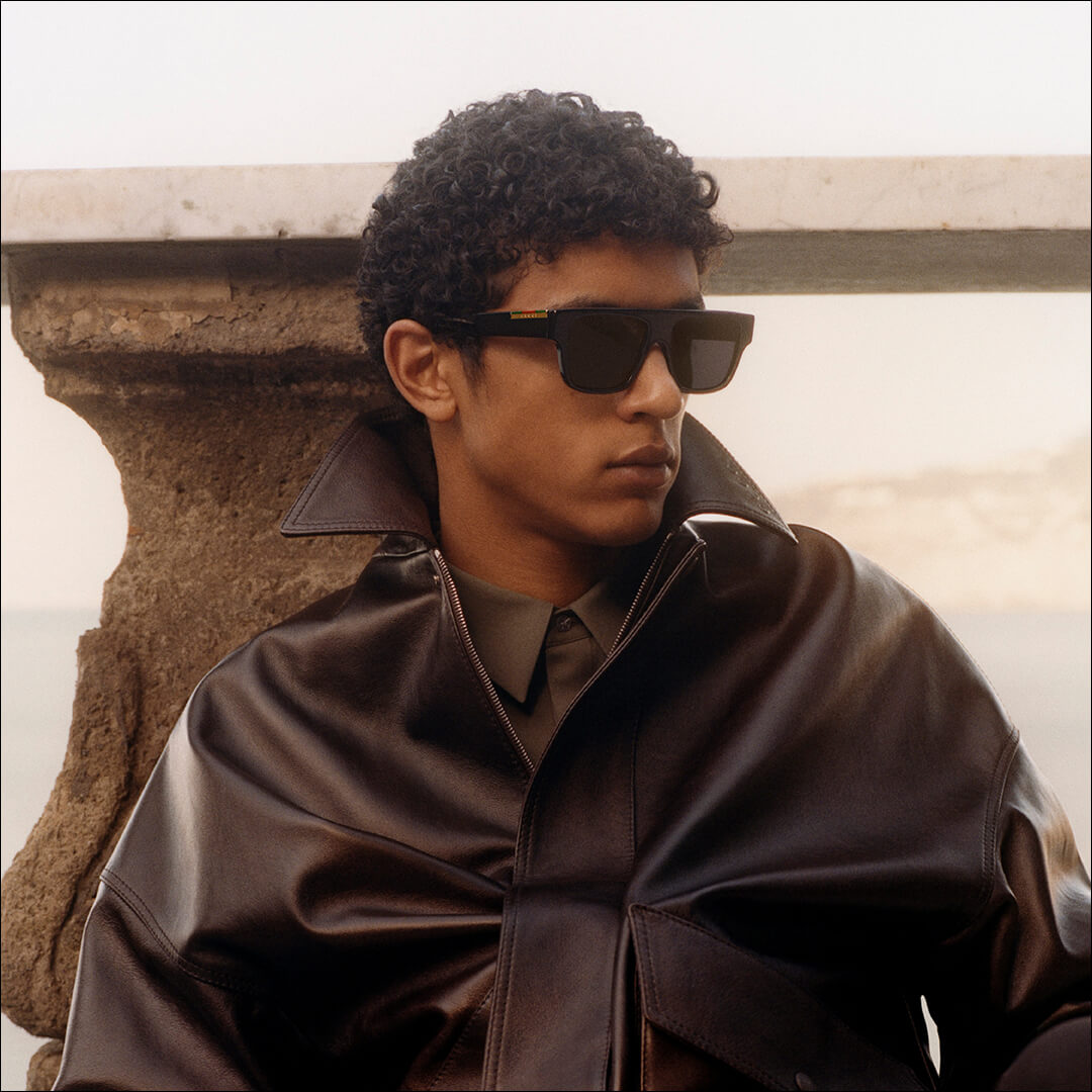 Man wearing Gucci sunglasses