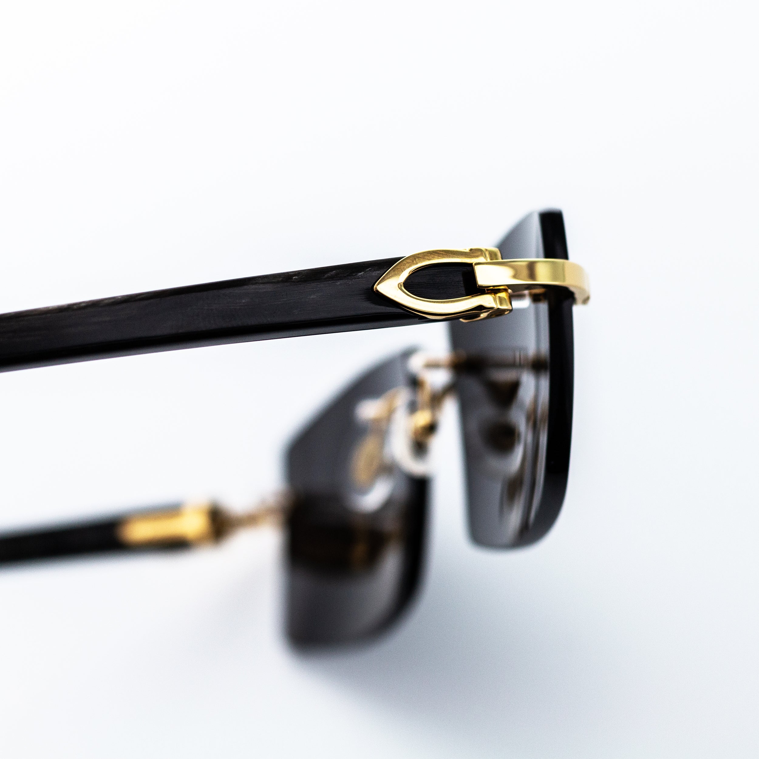 Black outlet cartier buffs